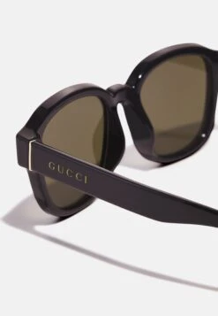 Gucci Unisex - Sunglasses - Black/Green -Zalando UK-Outlet 145b370d1bde4b4db5c21d1d0e470183