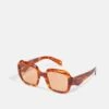Prada Sunglasses - Light Tortoise