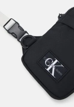 Calvin Klein Jeans Crossbody Bag Unisex - Across Body Bag - Black -Zalando UK-Outlet 285a72c8f38e45e4bcc006e60afa044d