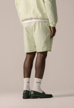 ALLOVER TRACK UNISEX - Shorts - Meadow Mist