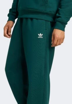 Adidas Originals ESS OPEN LOOSE - Tracksuit Bottoms - Aurora Ivy -Zalando UK-Outlet 38f57dff5ece488eb9d04b949bb2cd52