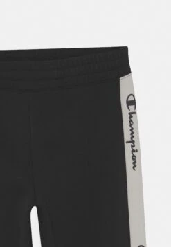 Champion Cuff Pants - Tracksuit Bottoms - Black -Zalando UK-Outlet 81a925a69508457bbf8a65eeb35fed73