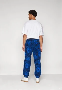 Lacoste Tracksuit Bottoms - Globe/navy Blue Lazuli -Zalando UK-Outlet 985b26ad470841cdbfdf7cf771a58922