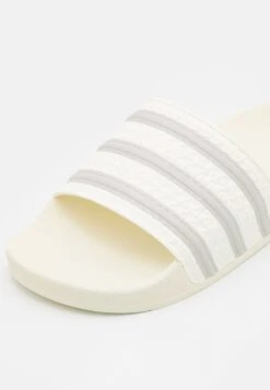 Adidas Originals Adilette Unisex - Mules - Off White/Grey One -Zalando UK-Outlet 9eb7d86f99c94482b99586b303fa07fd