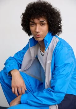 Nike Sportswear CLUB - Tracksuit - Light Photo Blue/obsidian/college Grey/white -Zalando UK-Outlet a672ae49688946e88d31f5af9de2803c