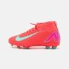 Nike Performance 10 CLUB UNISEX - Firm-ground Football Boots - Ember Glow/aurora Green