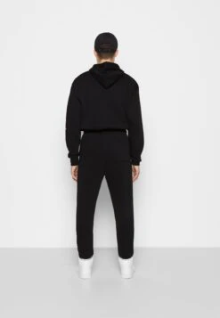 Jordan Pant - Tracksuit Bottoms - Black/Sail -Zalando UK-Outlet b7c12a9eb3c84a5d80abd8789ae6c3ed