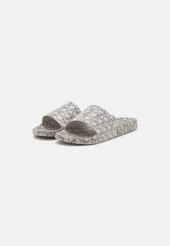 Calvin Klein Pool Slide - Mules -Zalando UK-Outlet bd610306a1444c8f8f9d7c84ae51b8f3