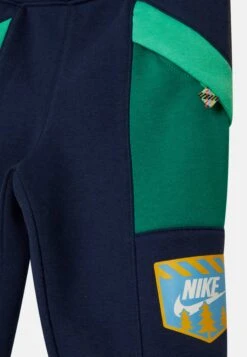 Nike Sportswear Great Outdoors Pant Unisex - Tracksuit Bottoms - Midnight Navy -Zalando UK-Outlet c63806b4dca84741ae8ee239e644d668