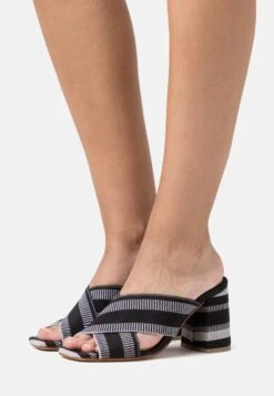 The Agbo - Heeled Mules