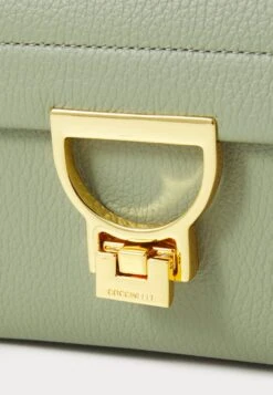 Coccinelle ARLETTIS - Handbag - Greenery -Zalando UK-Outlet e3f757ae9e6040f4a3848eeb468de394