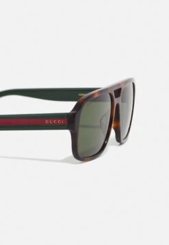 Gucci Sunglasses - Havana/Green -Zalando UK-Outlet f11c69a917b44b6eab93393d843ce1ac