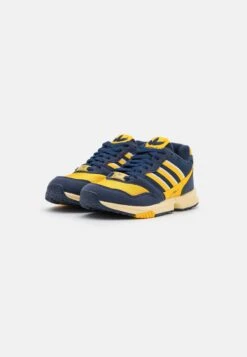 Adidas Originals Zx 1000 C Unisex - Trainers - Navy Blue/Bright Gold/White -Zalando UK-Outlet f4d9253c79bd4f9495f72c33c52ad965